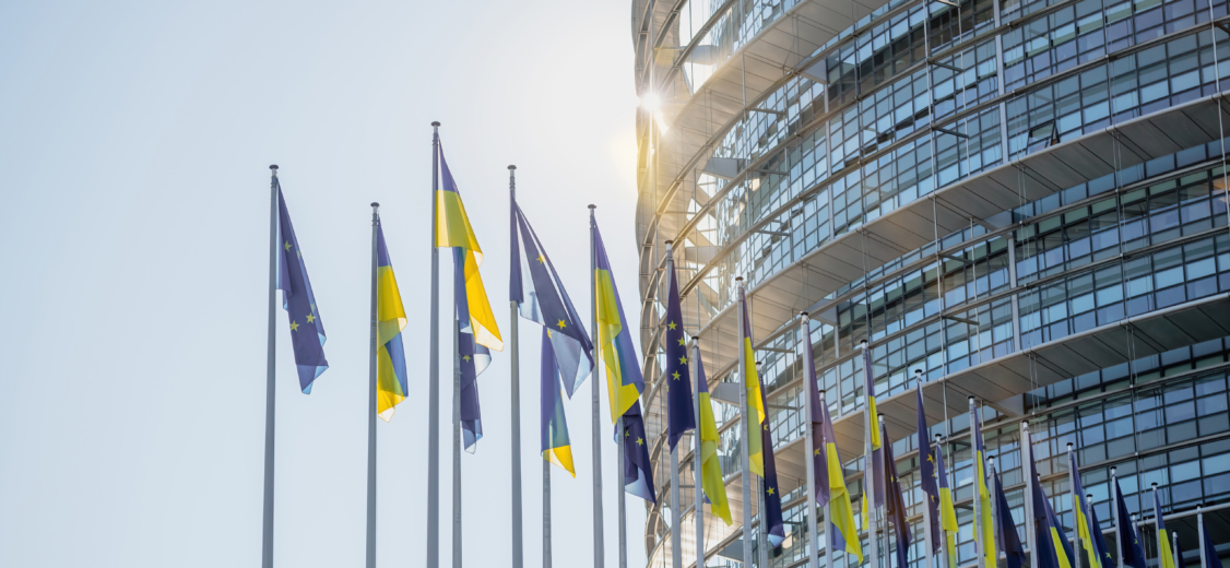 EU Parliament in Strasbourg with Ukrainian and EU flags flying together